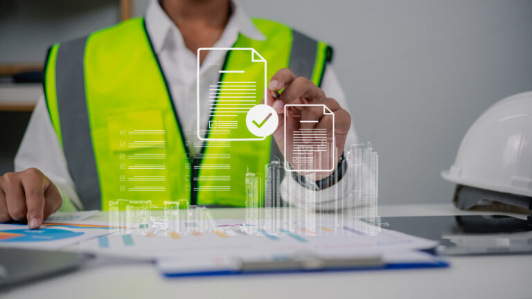 Engineer in safety vest pointing at digital document hologram with check mark and city building icon. Concept of smart construction, project approval, and architecture technology.